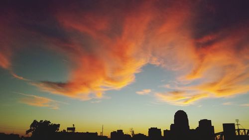 Scenic view of dramatic sky at sunset