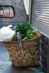 Vegetables in wicker basket on pick-up truck