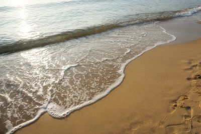 High angle view of surf on beach