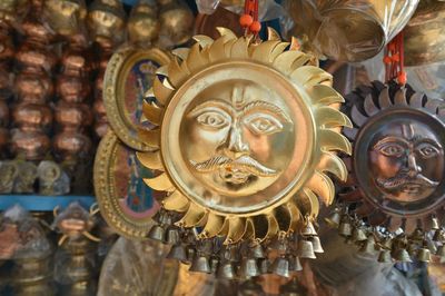 Close-up of metal decorations for sale in market