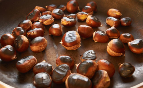 High angle view of roasted coffee beans on table