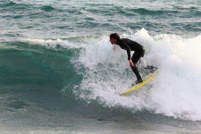 Man surfing in sea