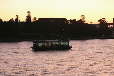 Scenic view of river at sunset