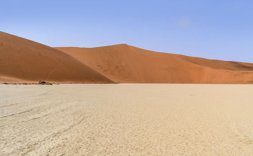 Scenic view of desert against clear sky