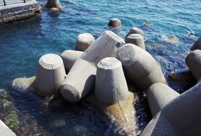 High angle view of rocks on shore