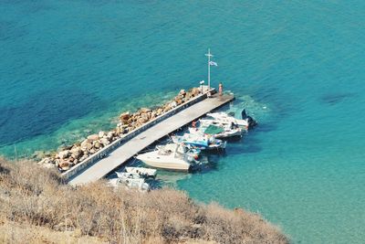 High angle view of sailboats on sea shore