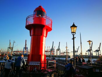 Lighthouse against clear blue sky