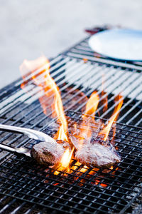 Close-up of fire on barbecue grill