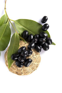 Close-up of fruits against white background