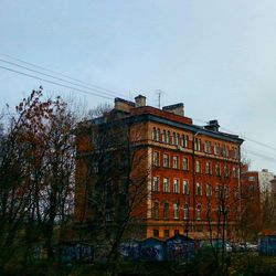 Low angle view of buildings against clear sky