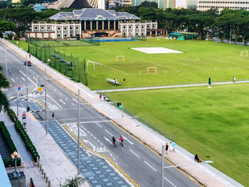 High angle view of people playing soccer field