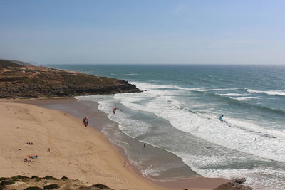 Scenic view of beach against clear sky