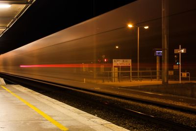 Railroad station platform at night