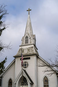 Low angle view of traditional church building against sky