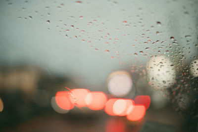 Close-up of raindrops on glass window