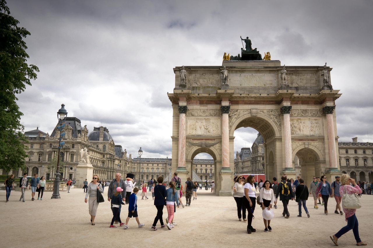 large group of people, architecture, built structure, building exterior, sky, person, men, tourism, famous place, tourist, travel destinations, history, cloud - sky, international landmark, mixed age range, travel, lifestyles, leisure activity, capital cities