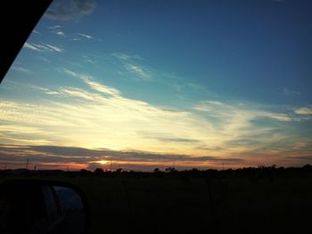 Scenic view of silhouette landscape against sky during sunset