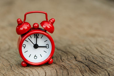 Close-up of clock on table