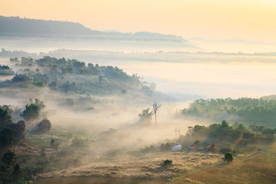 Scenic view of landscape against sky during sunset