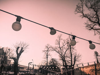 Low angle view of street light against sky