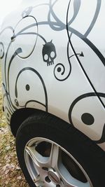 Close-up of circular object on wall