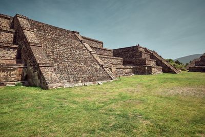 Low angle view of old building against sky