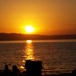 Scenic view of sea at sunset