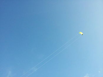 Low angle view of building against blue sky