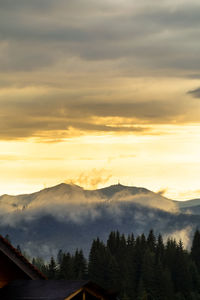 Scenic view of mountains against sky during sunset