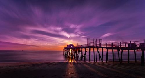 Scenic view of sea at sunset