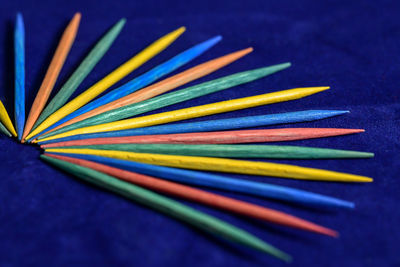 Close-up of multi colored pencils on table