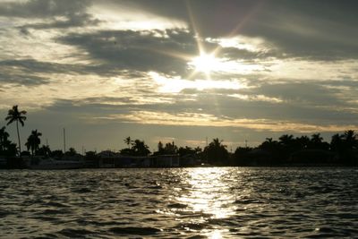 Scenic view of lake at sunset
