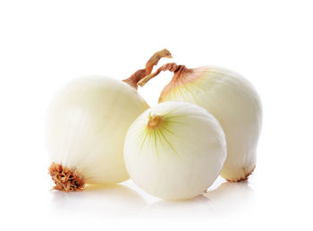 Close-up of garlic against white background