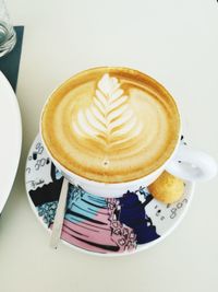 High angle view of cappuccino on table