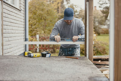 Carpenter building patio