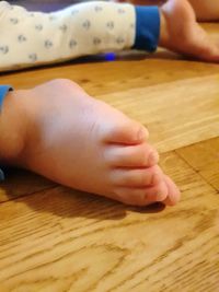 Close-up of hands playing on table