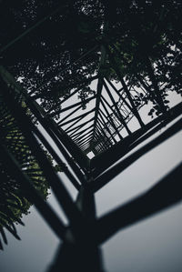 Low angle view of building seen through window