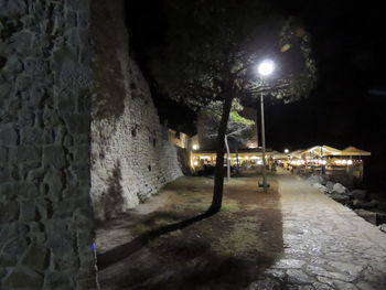 Illuminated street light at night