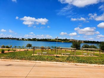 Scenic view of beach against blue sky