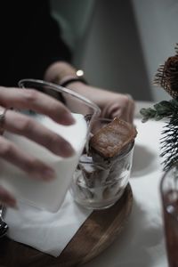 Close-up of hand holding drink