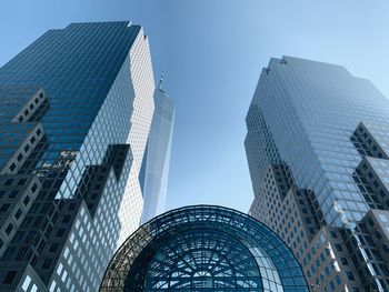 Low angle view of modern buildings against clear sky