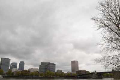 Buildings in city against sky