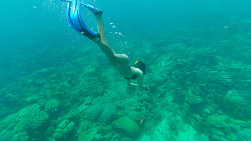 Man swimming in sea