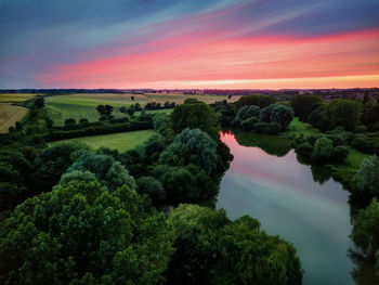 Scenic view of landscape against sky during sunset