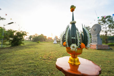 Close-up of trophy against sky