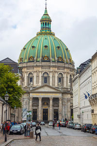 Tourists and locals near frederik's church, copenhagen, denmark.