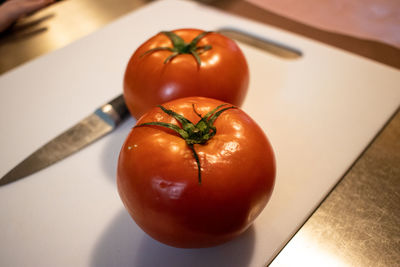 High angle view of cherry tomatoes on table