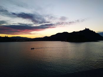 Scenic view of sea against sky at sunset