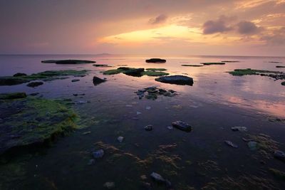 Scenic view of sea against sky during sunset