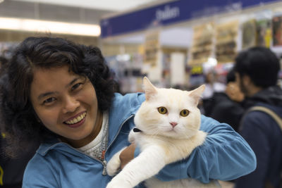 Portrait of cat with cats at home